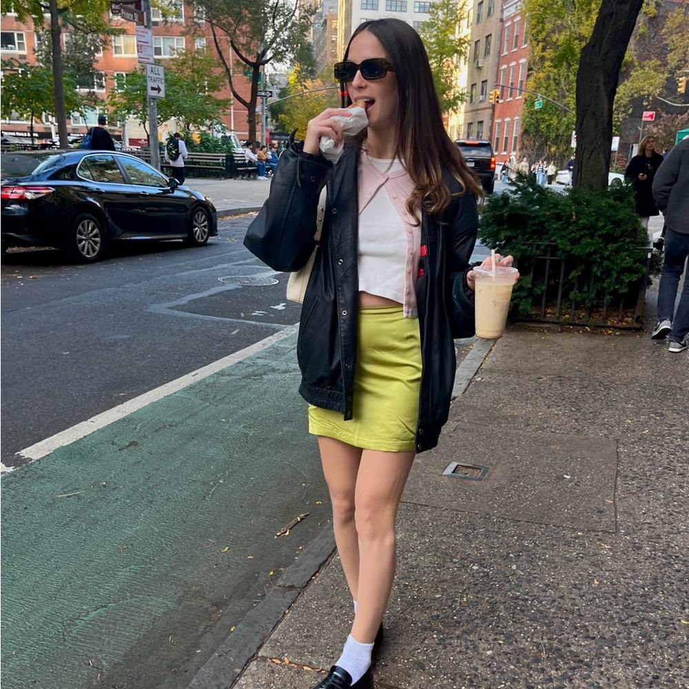 green mini skirt